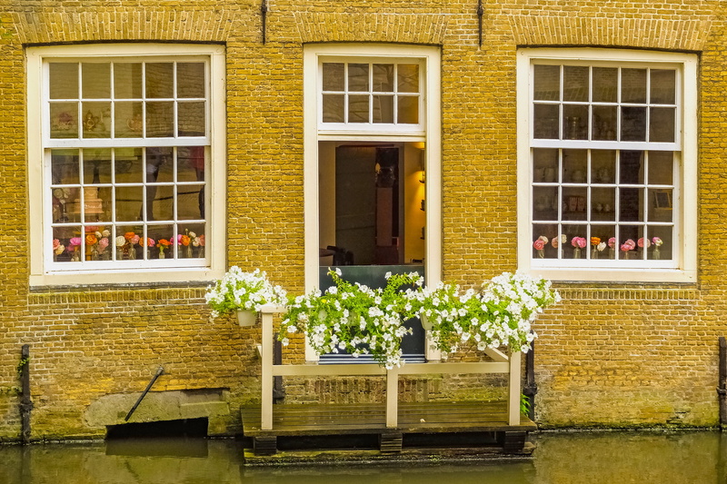 built structure, freshness, water, window, facade, day, luxury, home, nature, delft, flowers, outdoors, netherlands, building, canal, potted plant, building exterior