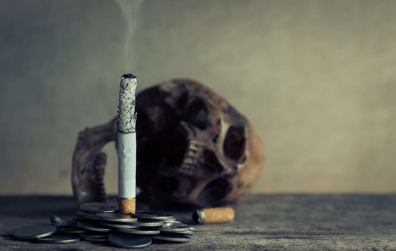human representation, die, indoors, smoke, horror, finance, no smoking, selective focus, low light, antique, burning, table, danger, wasted, focus on foreground