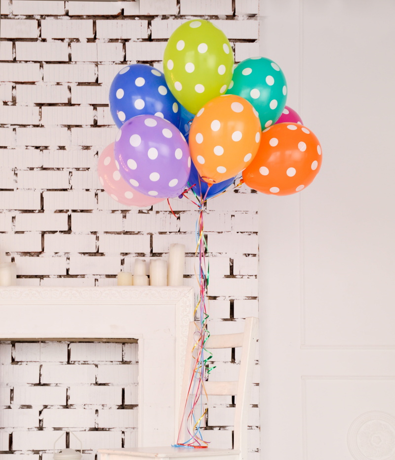 candle, balloon, low angle view, pattern, birthday, wall - building feature, orange, nature, day, building exterior, outdoors, color, inside, yellow, helium