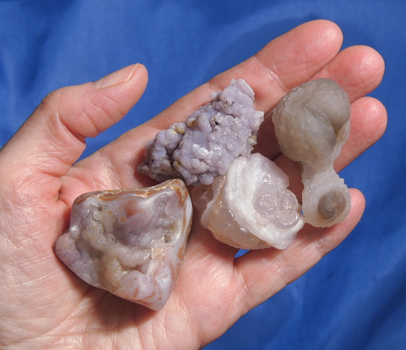 real people, colorful, indoors, freshness, healing, natural, finger, microcrystalline quartz, food, nature, close-up, blue, human Hand, holding, food and drink