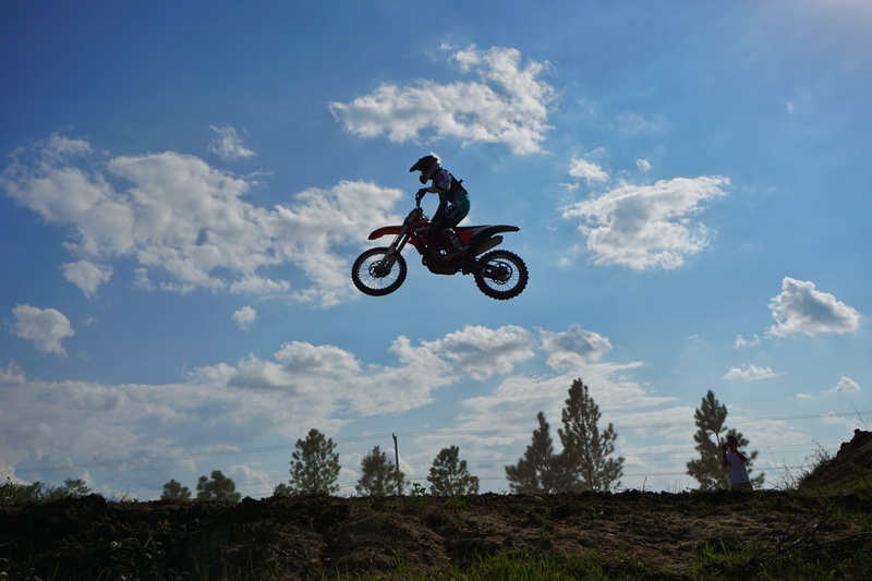 skill, clouds, nature, belize, mid-air, leisure activity, dirt bike, stunt, 5K, biker, riding, sport, fly, motorcycle, crash helmet, mode of transportation