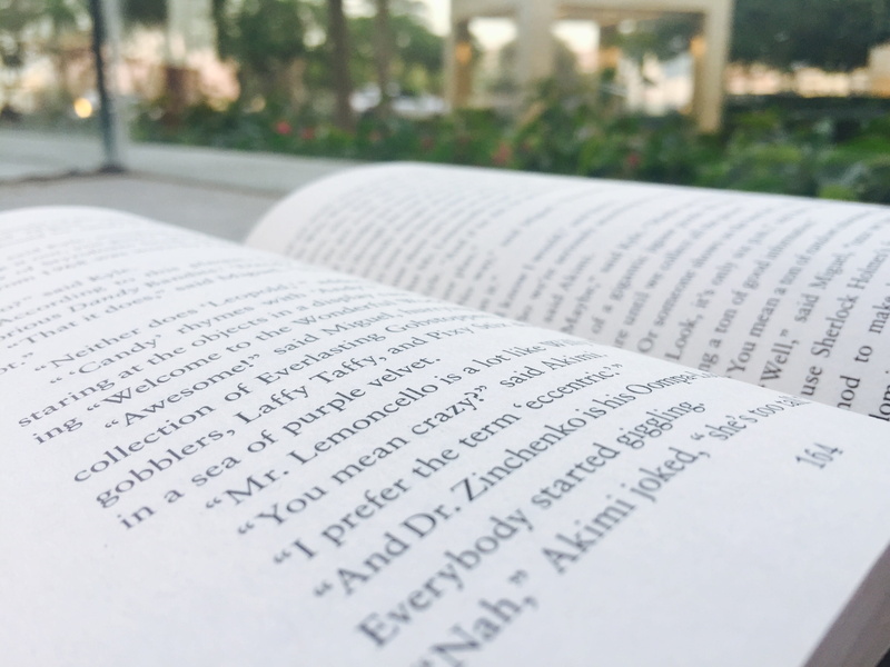 pages, book, communication, belief, close-up, literature, publication, dubai, no people, text, outside, education, selective focus, trees, united arab emirates
