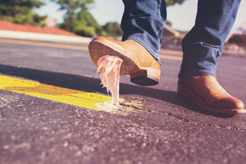 casual clothing, gum, transportation, real people, oops, surface level, sign, human leg, lifestyles, step, mistake, low section, human limb, outdoors, limb