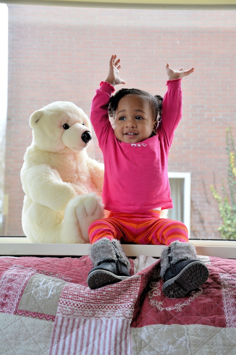 raised, smiling, full length, toy, arms raised, lifestyle, females, human limb, looking at camera, children, soft, indoors, hands, 1080P, joyful, teddy bear