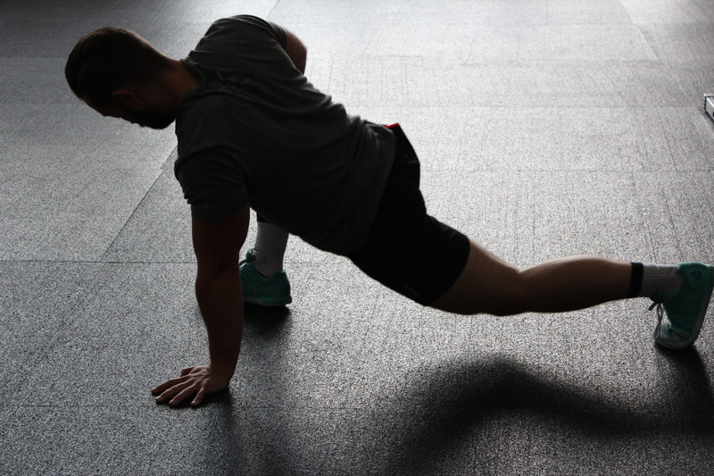 lifestyles, full length, person, adult, flooring, males, pushup, side view, indoors, sporty, child, high angle view, shadow, human body part, childhood
