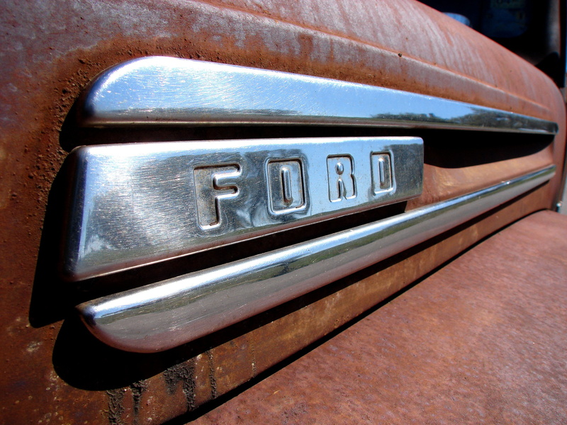 silver colored, capital letter, close-up, day, text, ford, mail slot, land vehicle, communication, indoors, letter, wood - material, western script, no people