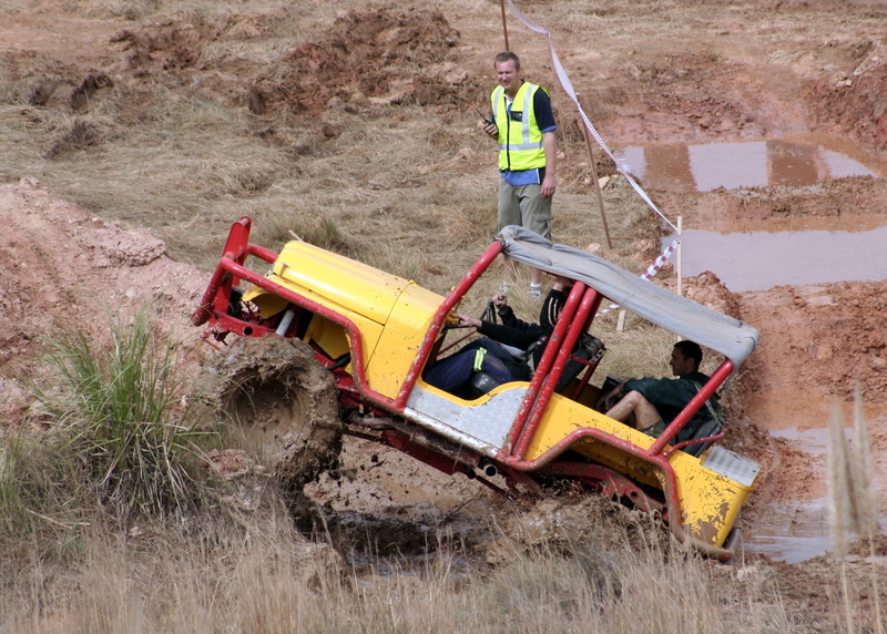 outdoors, construction site, construction worker, one person, development, wheel, mode of transportation, suv, outdoor, construction machinery, construction industry
