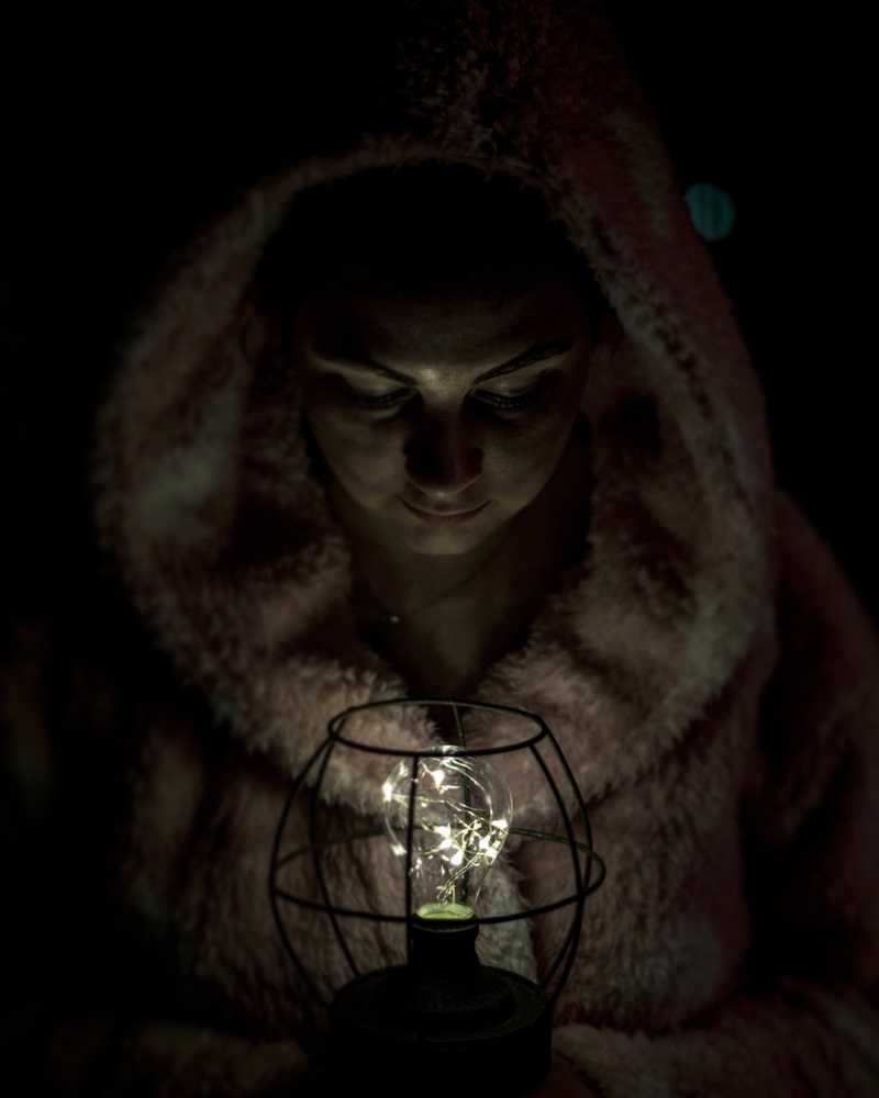 1080P, women, looking at camera, fear, electric lamp, face, illuminated, electricity, light bulb, black background, lights, horror, candle, close-up, bizarre