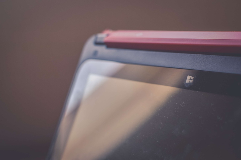 table, communication, pink color, selective focus, red, still life, convenience, day, business, reflections, lights, indoors, single object, windows, motion