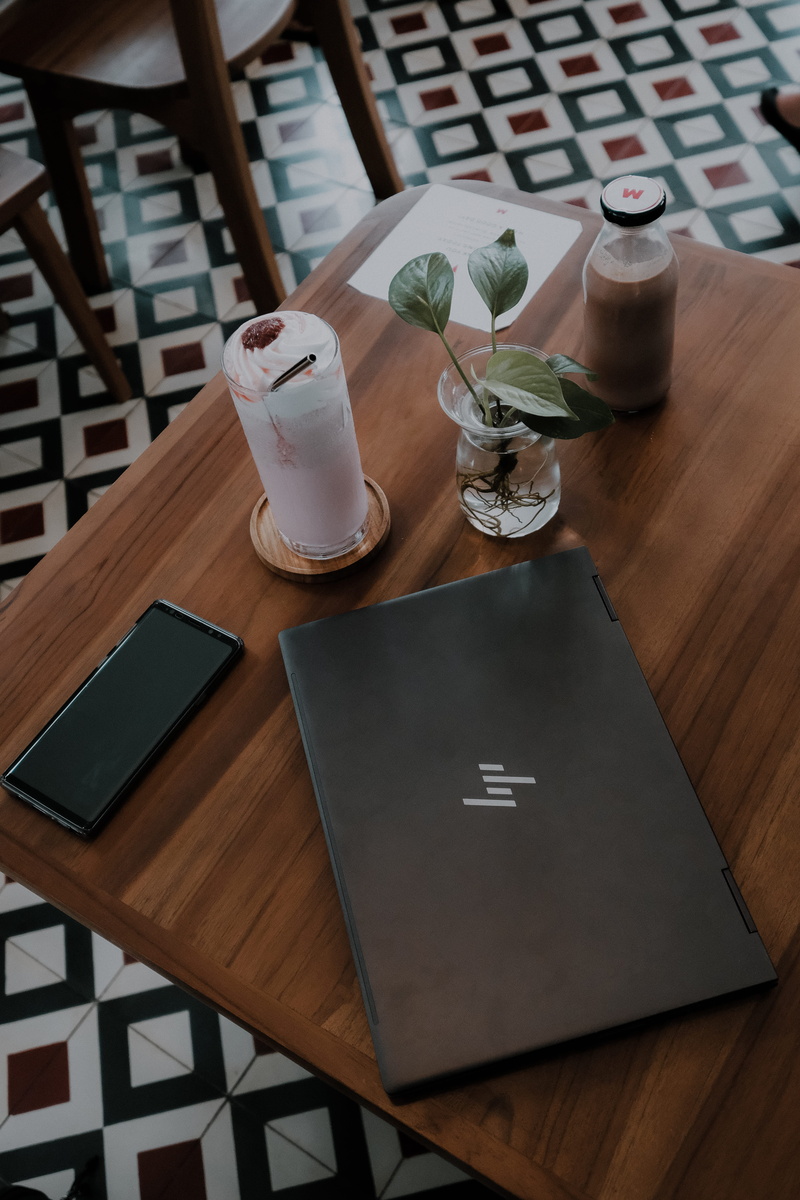 household equipment, drink, drinking glass, no people, brown, indoors, freshness, refreshment, wood - material, wireless technology, black, technology