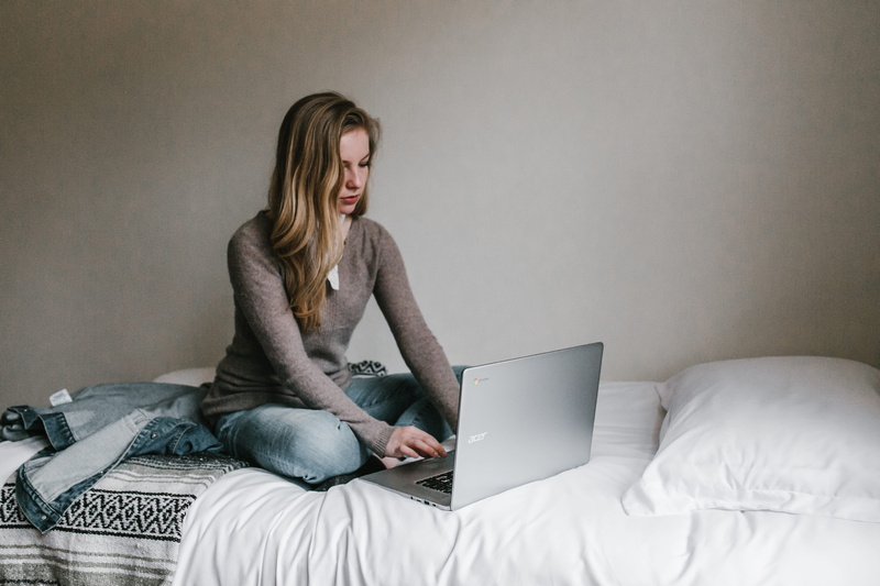 pro, room, sits, women, one person, casual clothing, macbook, full length, furniture, technology, surfing the net, communication, connection, 5K, laptop