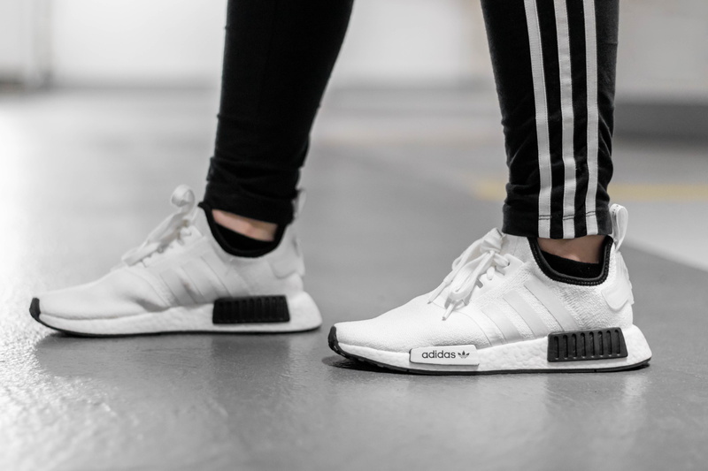 nmd, close-up, person, standing, canvas shoe, shoes, shoe, adult, human foot, body part, 5K, limb, wearing, skill, sock, low section, human leg, fashion