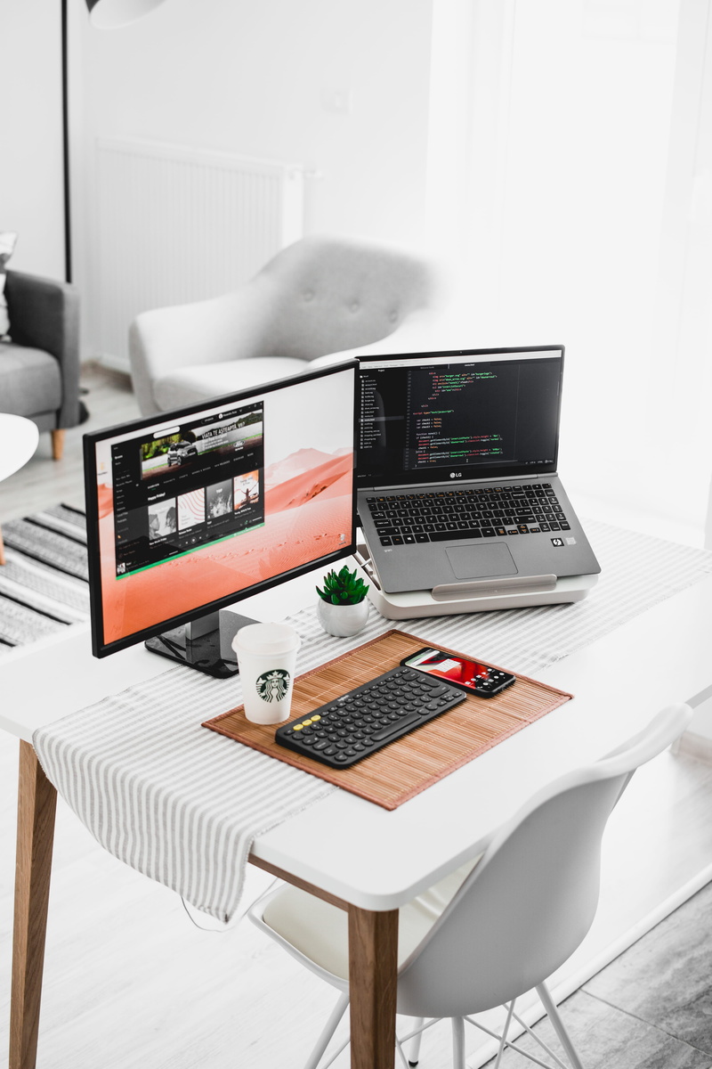 white, laptop, monitor, computer, table, coffee cup, desk, desk space, connection, home interior, work table, no people, chair, desk setup, technology