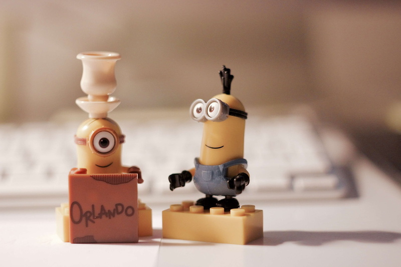minioski, small, capital letter, no people, technology, western script, fun, robot, desk, close-up, emotion, focus on foreground, representation, setup