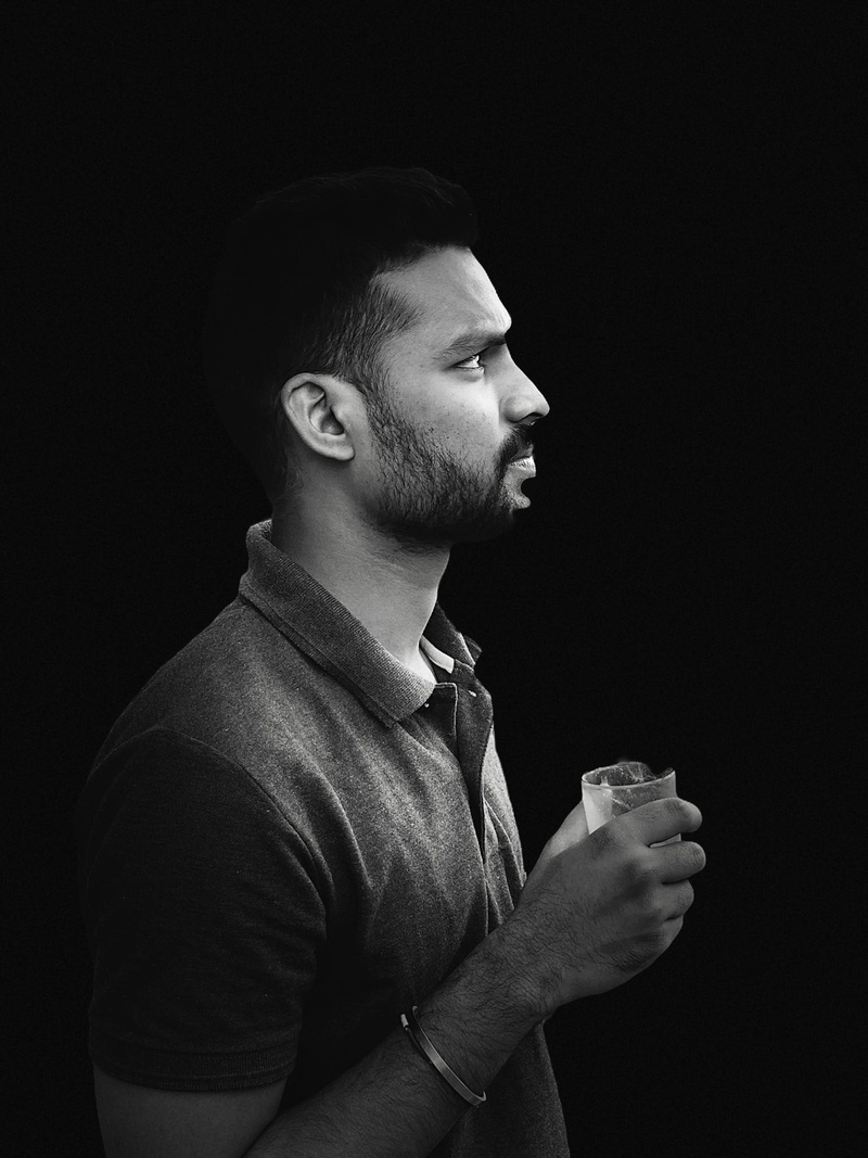 studio shot, bengaluru, blackandwhite, fashion, leisure activity, black background, india, looking, beautiful people, young men, lifestyles, beard, drinking