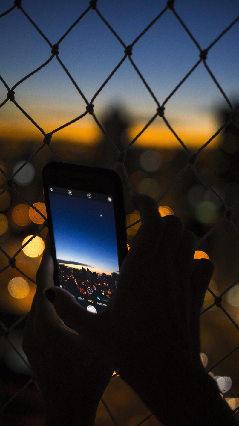 cell phone, holding, iphone 8 plus, iphone x, technology, hand, person, outdoors, mobile phone, wireless technology, sky, one person, smart phone, phone