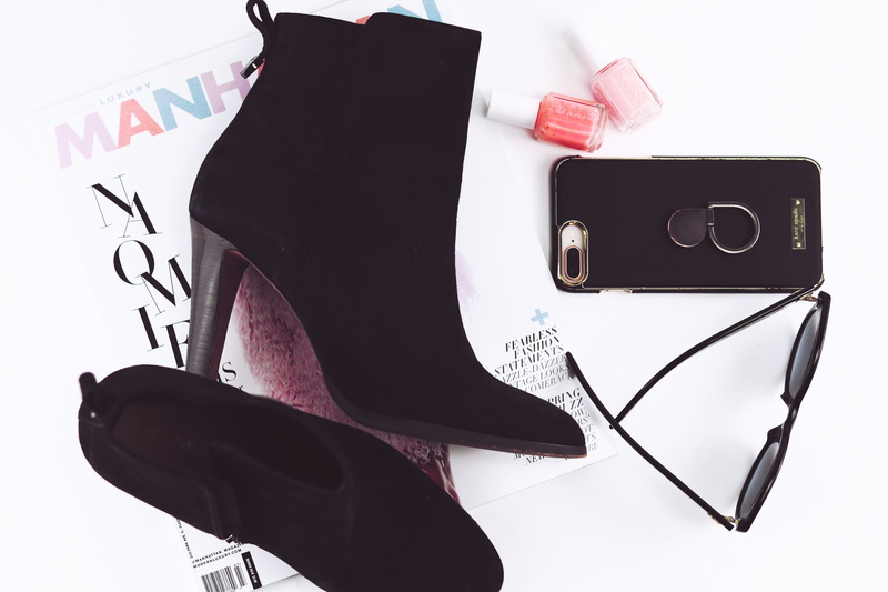 focus on foreground, white background, close-up, indoors, communication, booties, equipment, studio shot, digital camera, no people, iphone, table, camera - photographic equipment