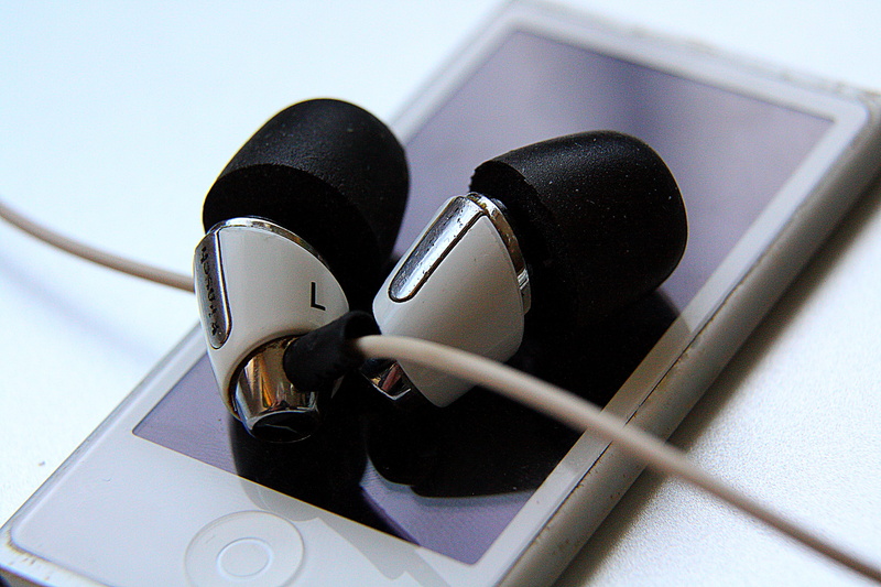 in-ear headphones, arts culture and entertainment, high angle view, sound, listen to music, audio, close-up, listening, communication, computer, connection