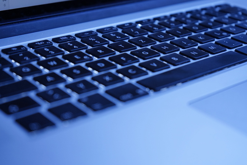 computer keyboard, global communications, indoors, blue, alphabet, computer, computer equipment, close-up, electrical equipment, keyboard, single object