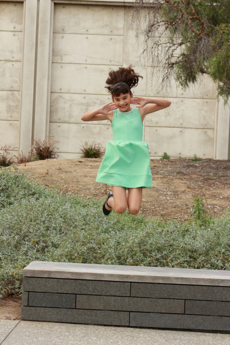 concrete, happy, human arm, bench, child, teen, 5K, one girl only, childhood, innocence, females, leisure activity, girls, hispanic, architecture, women