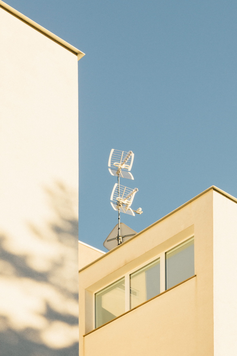blue, sunny, window, nature, day, clear sky, weather vane, antenna, high section, residential district, no people, built structure, building exterior, sky