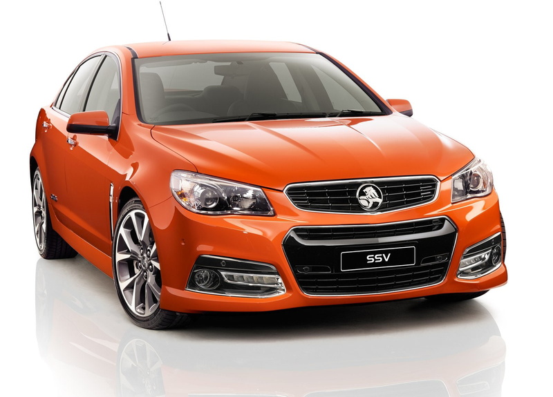 white background, vf, motor vehicle, car, front view, silver colored, transportation, luxury, wealth, stationary, ssv, orange color, holden, indoors, metal
