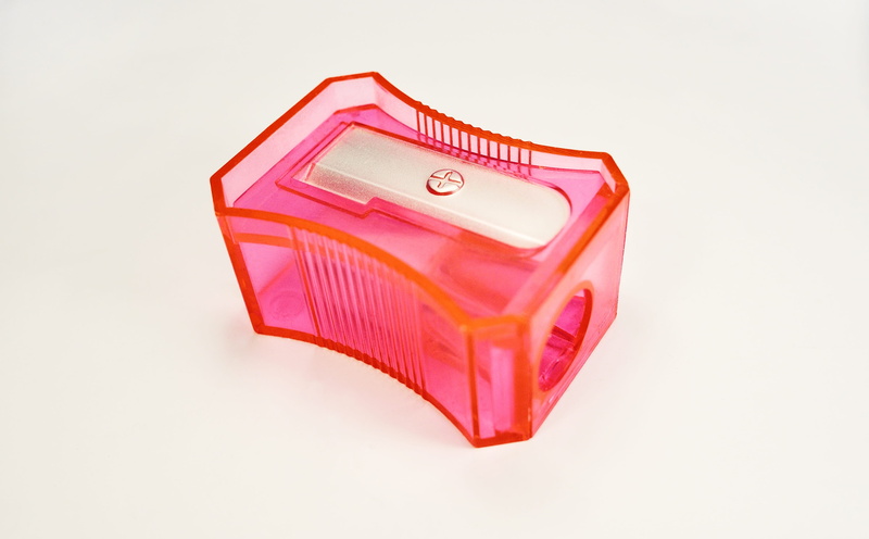creativity, finance, tool, single object, shavings, desk, wealth, school, security, pencil sharpener, pink, close-up, office, business, studio shot, neon pink