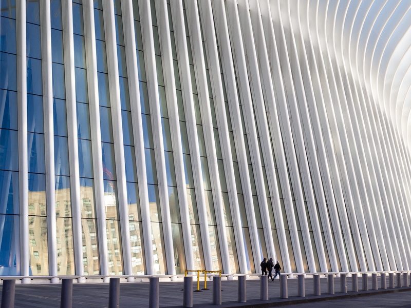 human, three, convention center, person, glass - material, lifestyles, banister, architecture, adult, airport, new york, high, white, plant, outdoors, office building exterior