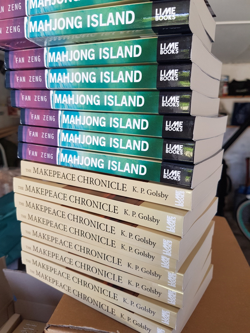 publication, stack, close-up, text, information, non-western script, communication, western script, real people, incidental people, focus on foreground