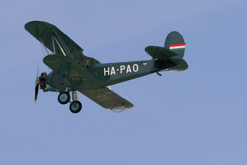 blue, outdoors, sunny, flying, plane, transportation, air vehicle, propeller, military airplane, aircraft, biplane, airplane, aerospace industry, directly below