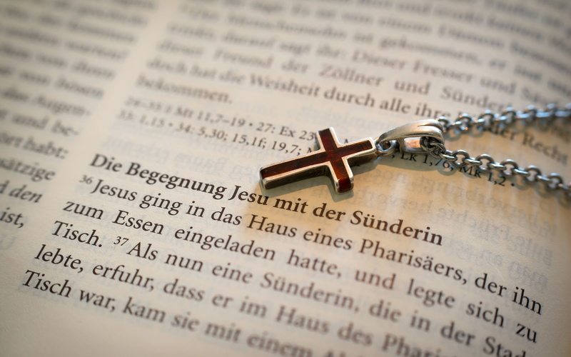 open, belief, publication, books, love, metal, close-up, page, text, no people, spirituality, religious equipment, paper, wisdom, necklace, communication