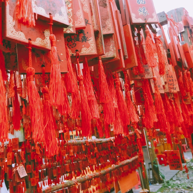 large group of objects, religion, spirituality, script, day, university student, shrine, no people, place of worship, architecture, text, religious equipment