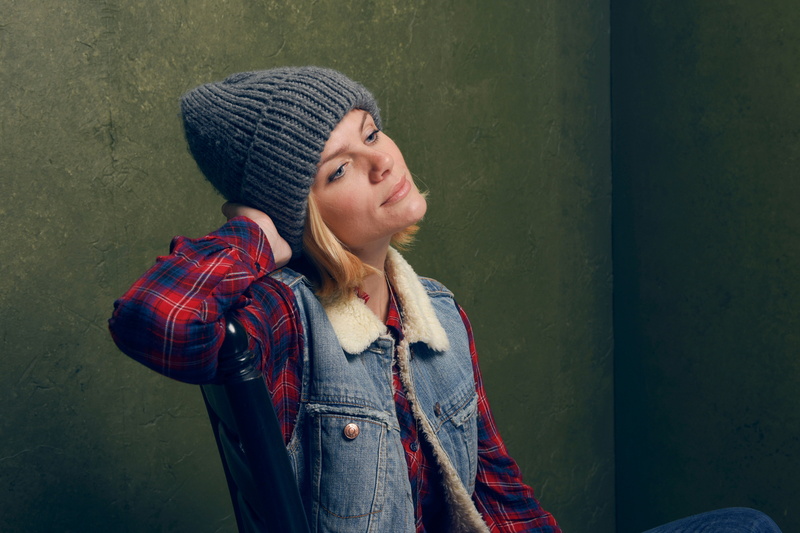 warm clothing, jean jacket, standing, lifestyles, looking, front view, clothing, leisure activity, casual clothing, waist up, wall - building feature, portrait