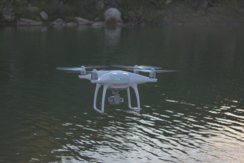 4K, representation, waterfront, body, lake, top, technology, surveillance, security, mid-air, rippled, rock, motion, nature, reflection, ocean, no people