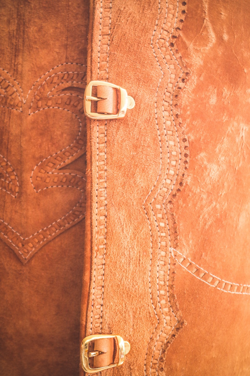 done, cowboy, fashion, indoors, manual work, clothing, metal, buckle, textured, hand, wood - material, necklace, bag, leather, shoe, cover, crafts, drawing