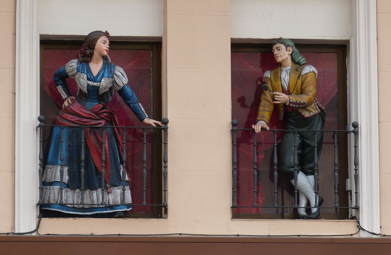 balcony, standing, window, entertainment, spain, human representation, rose, statue, young adult, madrid, glass - material, terrace, historically, building exterior