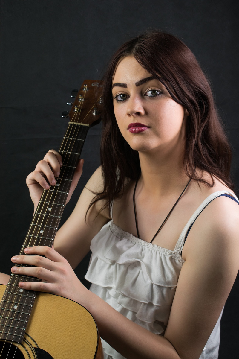 hairstyle, young adult, guitarist, pretty, 5K, front view, looking at camera, woman, women, guitar, long hair, musician, waist up, beauty, portrait of a woman