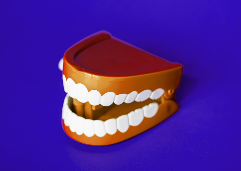 artificial, white color, clinic, beauty, studio shot, close up, colorful, close-up, chattering teeth, denture, blue, medicine, clean, bright, blue background