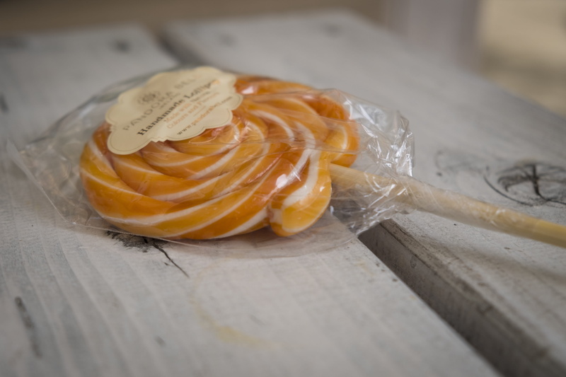 indoors, confectionery, nibble, paper, food, feed, slice, no people, healthy eating, sugar, high angle view, yellow, sweetness, delicious, nutrition, close-up