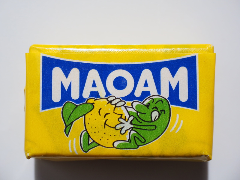 unhealthy, frivolous, maoam maomix, hand made sweets, yellow, animal, chewy candy, food and drink, fellatio, suck, paper, calories, close-up, single object