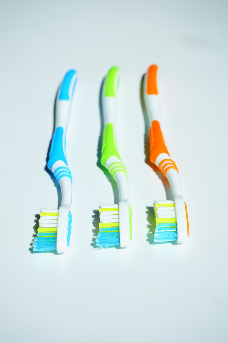 hygiene, green color, toothbrush head, side by side, variation, group of objects, medium group of objects, dentist, orange, connection, cut out, no people