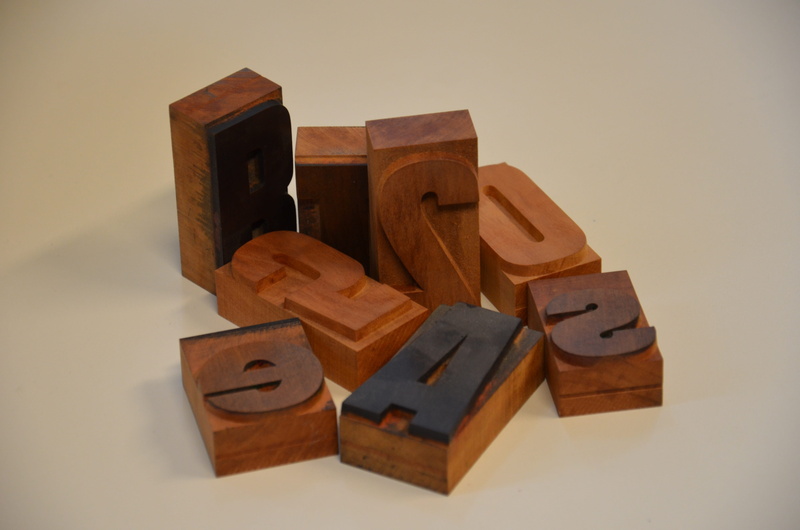 moving letter, letter, communication, wood - material, large group of objects, mirrored, brown, print set, indoors, letters, studio shot, toy block, table