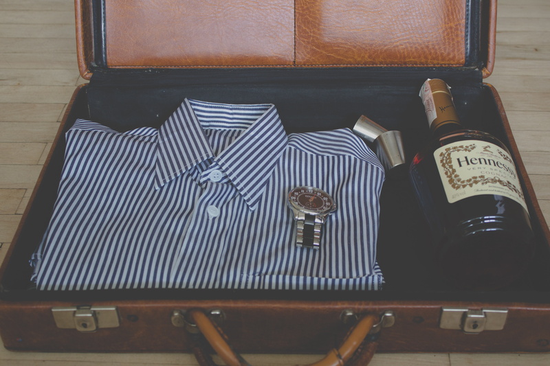 alcohol, wine bottle, home interior, indoors, container, collared, s, day, bottle, wine, shirt, drink, no people, objects, refreshment, suitcase, wood - material