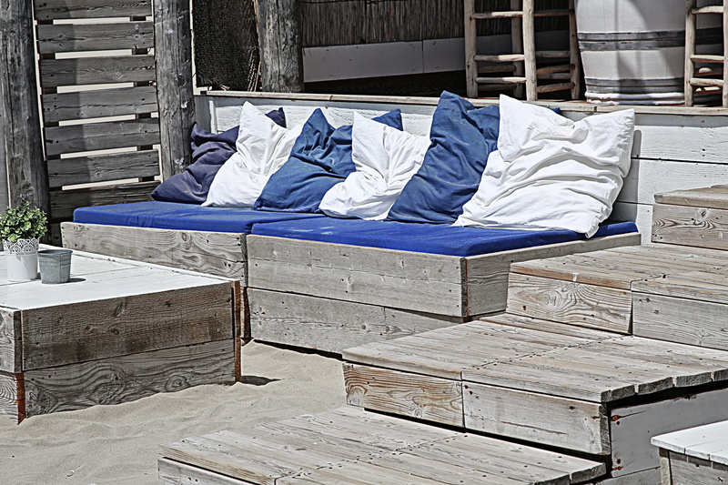 built structure, paper, relaxation, day, pillows, bed, plastic, fabric, building, bench, white, indoors, blue, design, stack, seat, architecture, three