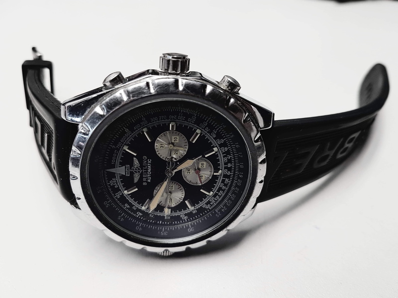 steel, object, fehèr, hour s, kèz, fèrfi, brand, indoors, accurate, metal, breitling, close-up, personal accessory, clock, sports, wealth, elegant, wristwatch