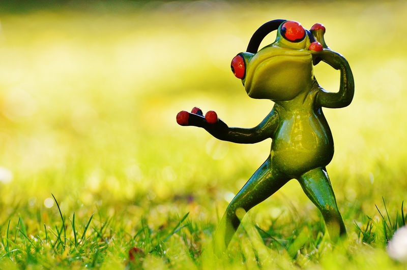 day, focus on foreground, toy, field, fun, grass, animal, figure, standing, craft, eyed, nature, still life, sweet, representation, green, art stone, funny