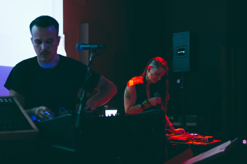 young men, dj, 5K, lifestyles, stage, people, indoors, real people, waist up, men, music, skill, young adult, california institute of the arts, casual clothing