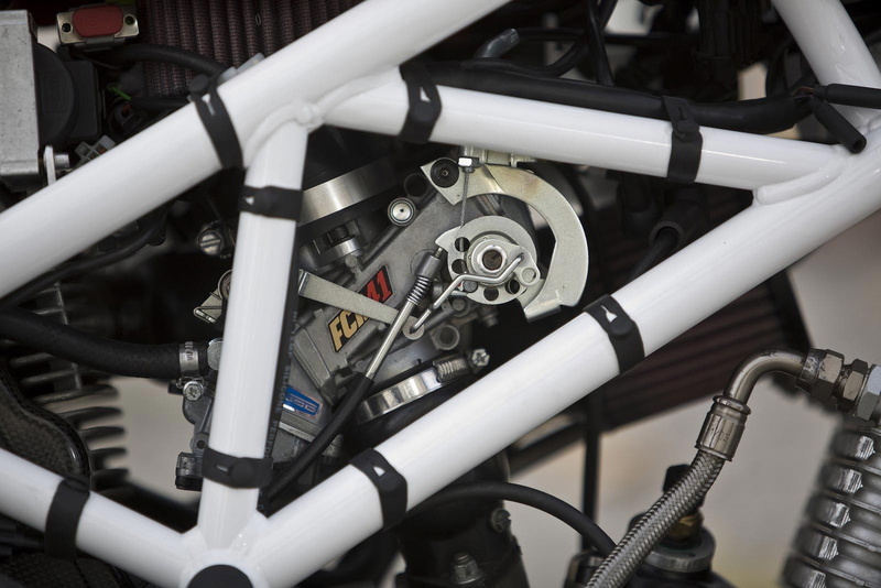machinery, close-up, 720P, day, transportation, motorcycle, fuel and power generation, complexity, equipment, technology, white color, land vehicle, cable