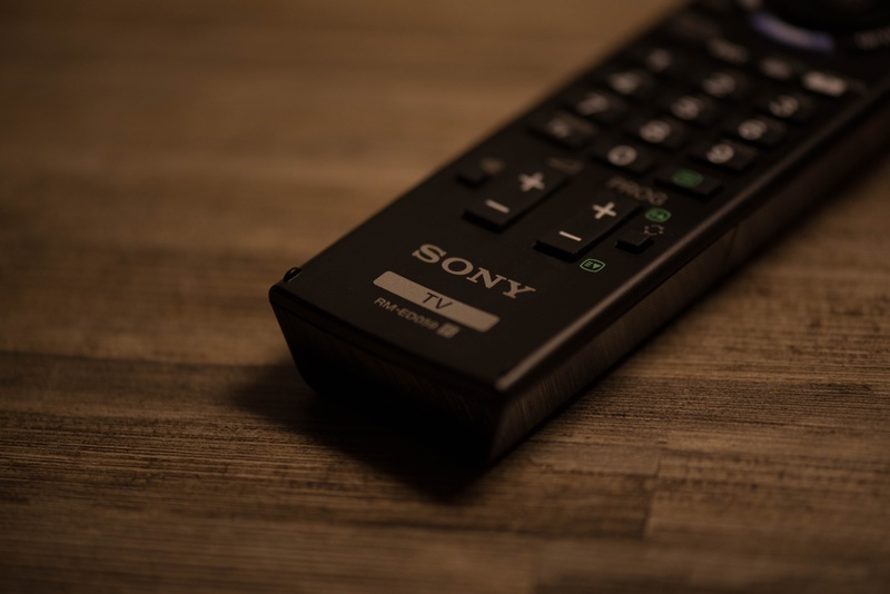 tv, table, television, single object, wood - material, wireless technology, no people, channel, connection, surface, communication, 5K, finance, remote