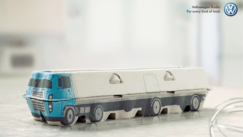 Volkswagen, truck, day, land vehicle, mode of transportation, motion, text, no people, racecar, artwork, focus on foreground, car, motor vehicle, toy, indoors